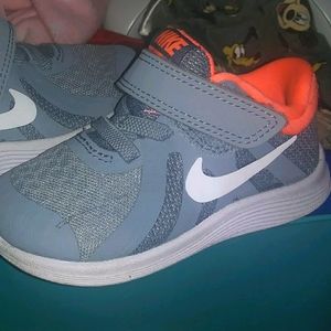 Pink and gray toddler nikes and  cat & jack shoes